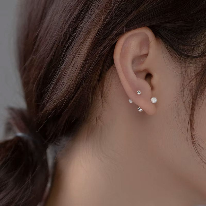 Elza - Studs med hamrad yta och skruvplopp