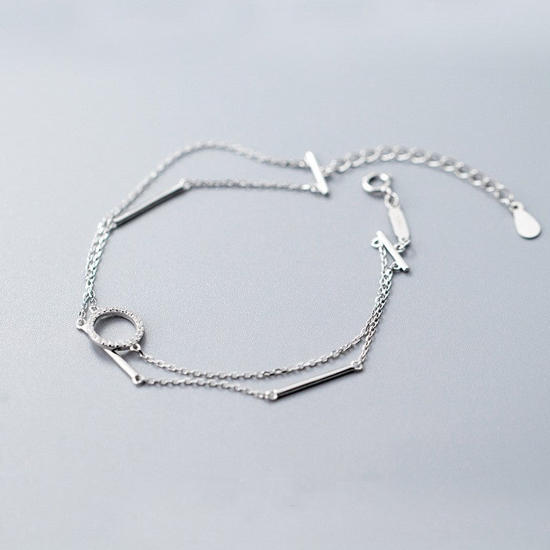 Harpa - Armband med dubbla kedjor och glittrande dekoration