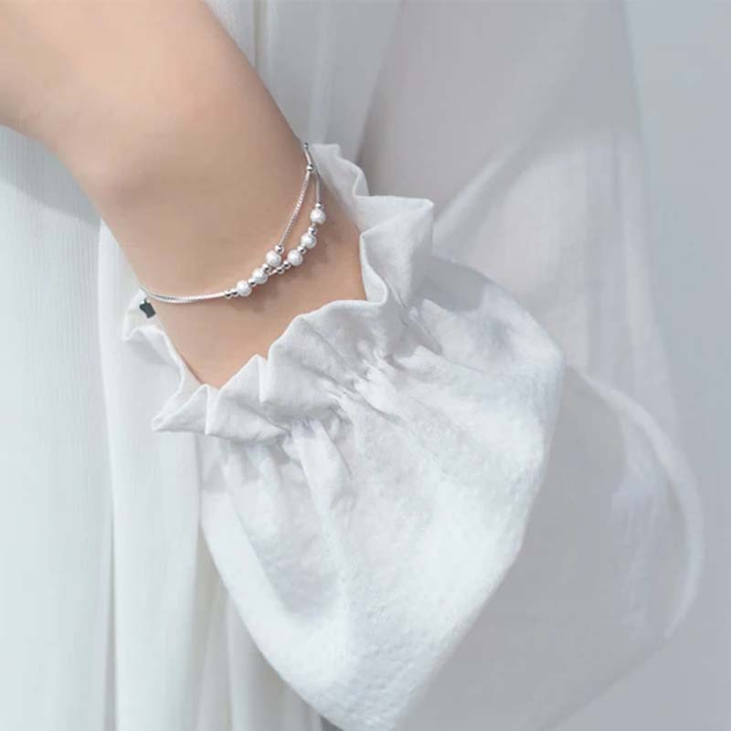 Lizzie - Armband med dubbla kedjor och dekorativa kulor