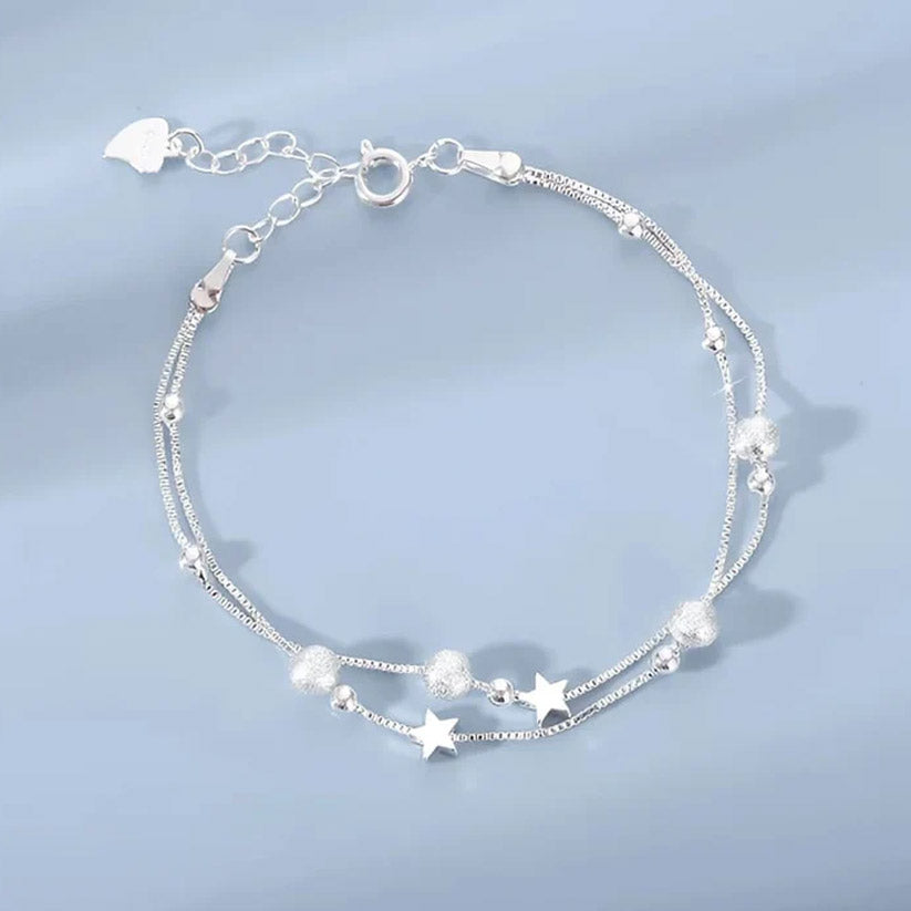 Nova - Armband med dubbla kedjor och kosmiskt motiv