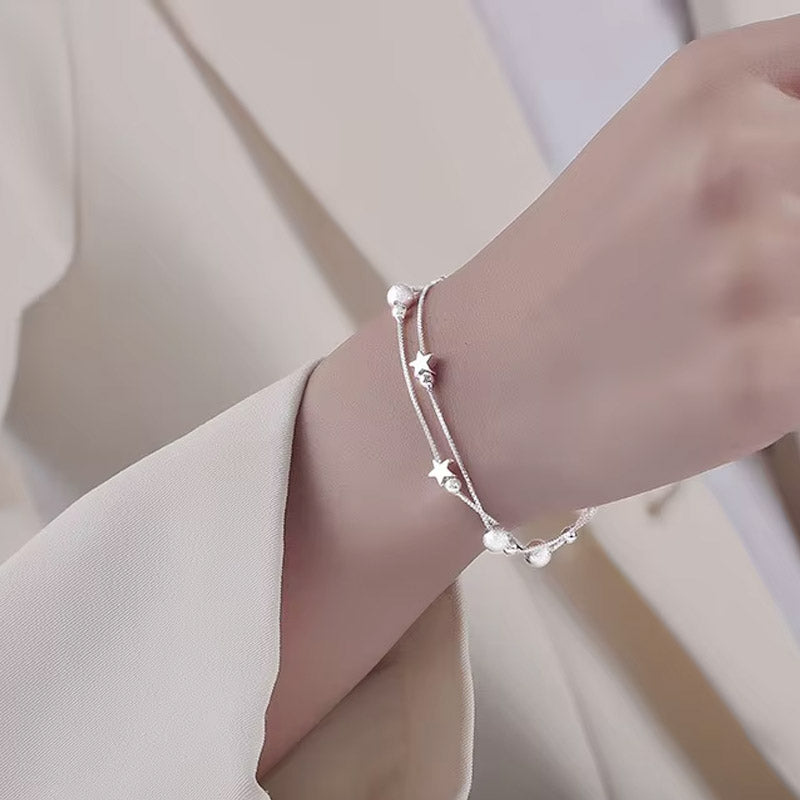 Nova - Armband med dubbla kedjor och kosmiskt motiv