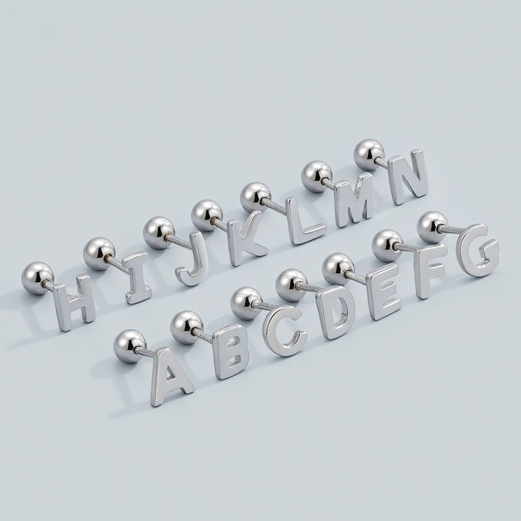 Signatur - Studs med bokstav och skruvplopp