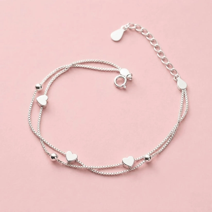Evelyn – Armband med dubbla kedjor och små hjärtan