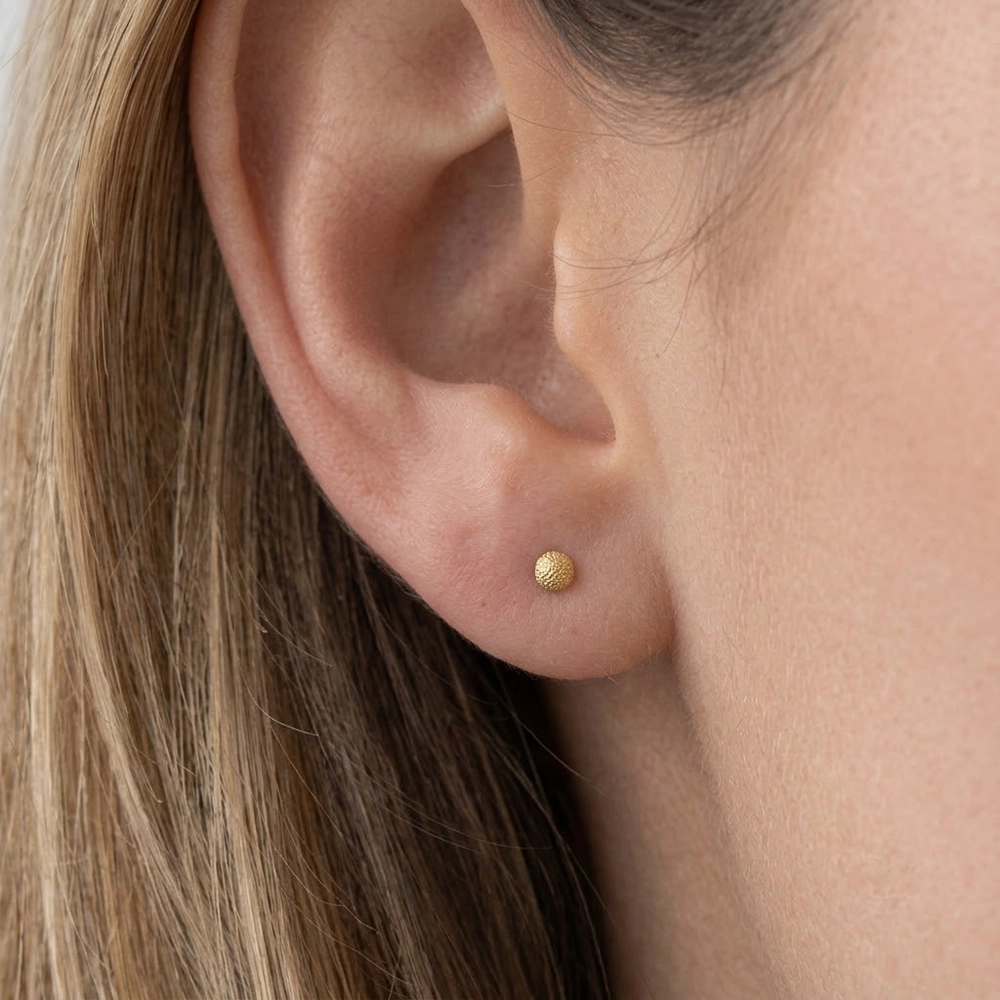 Elza – Studs med hamrad yta och skruvplopp