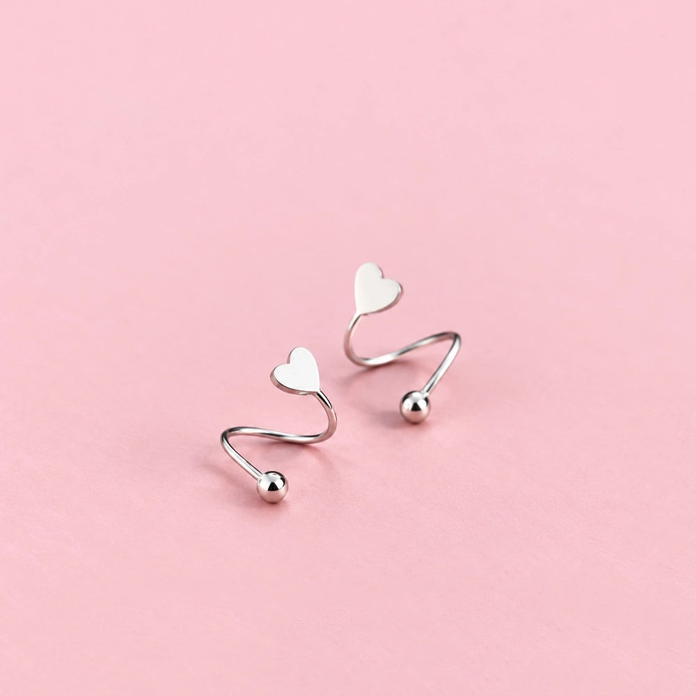 Twisted Heart & Star – Örhängen med unik twistdesign