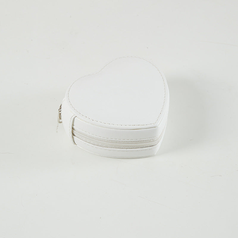 Älsklingsasken - Hjärtformat smyckeskrin i läder med blixtlås