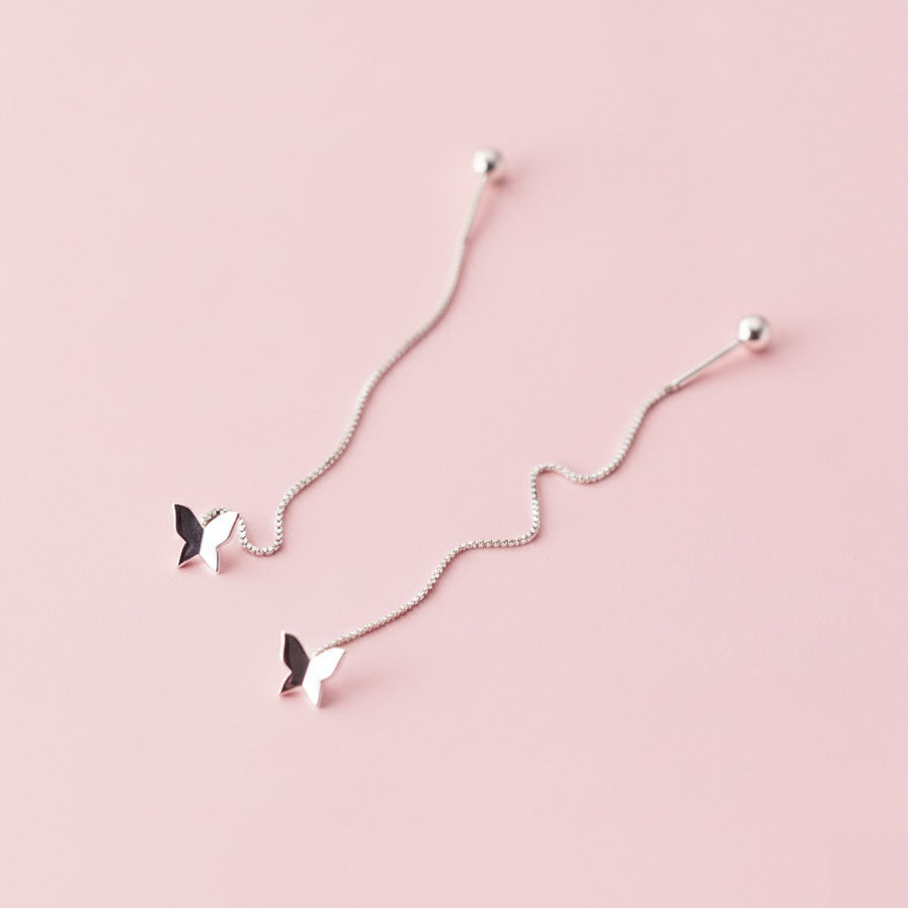 Aimeé - Örhängen med tasseldesign och fjäril