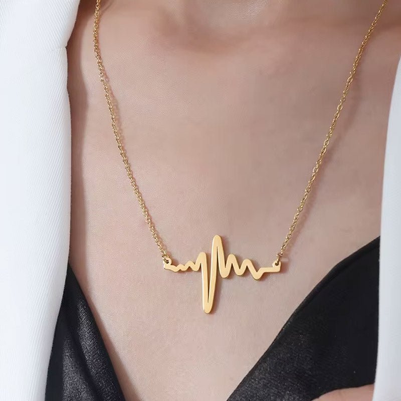 Beat - Halsband med EKG - kurva