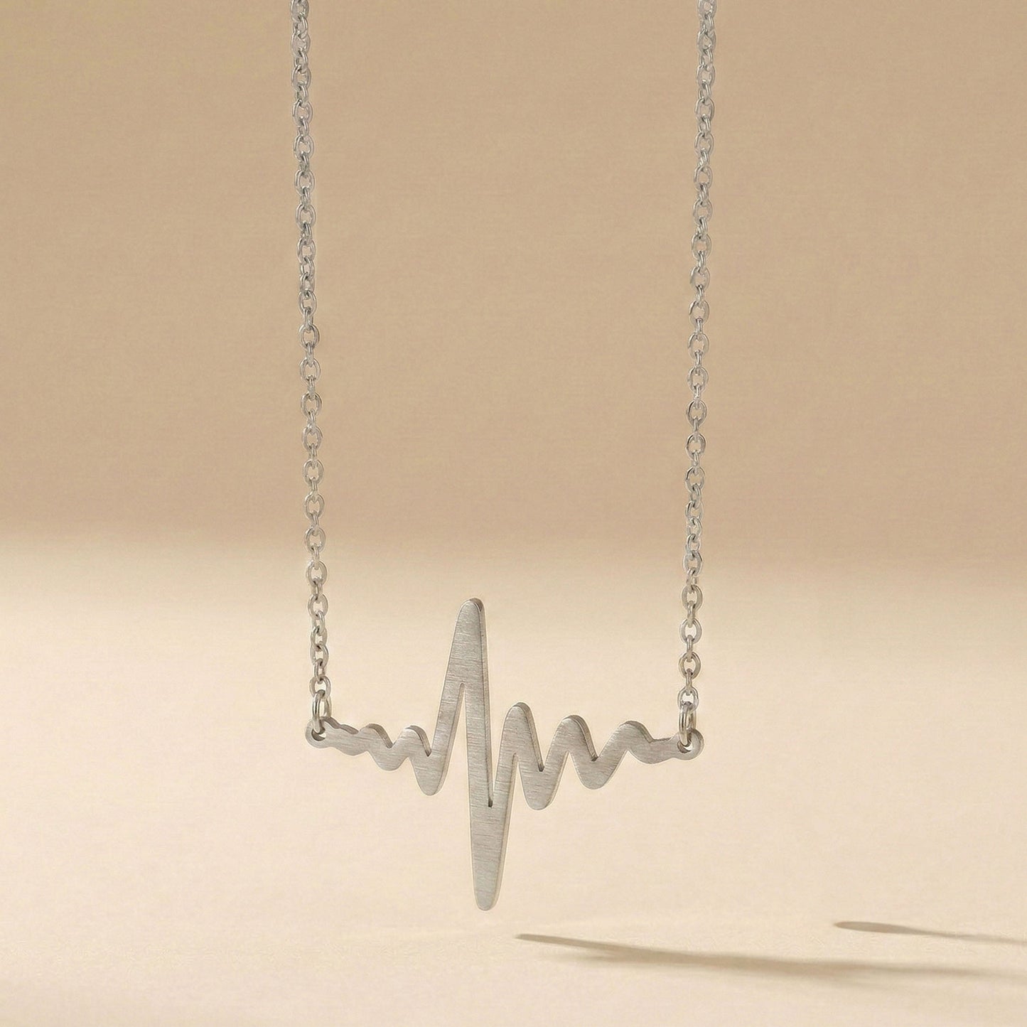 Beat - Halsband med EKG - kurva