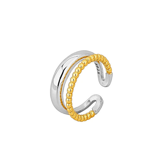 Brynja - Stilfull earcuff med gulddetaljer