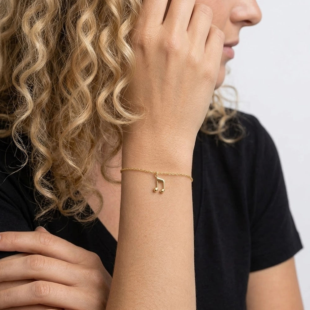 Decibelle – Armband med nothänge