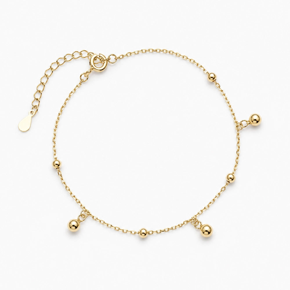 Elvie - Tunt armband med runda detaljer