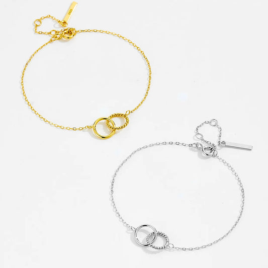 Eterna – Armband med sammanvävda ringar