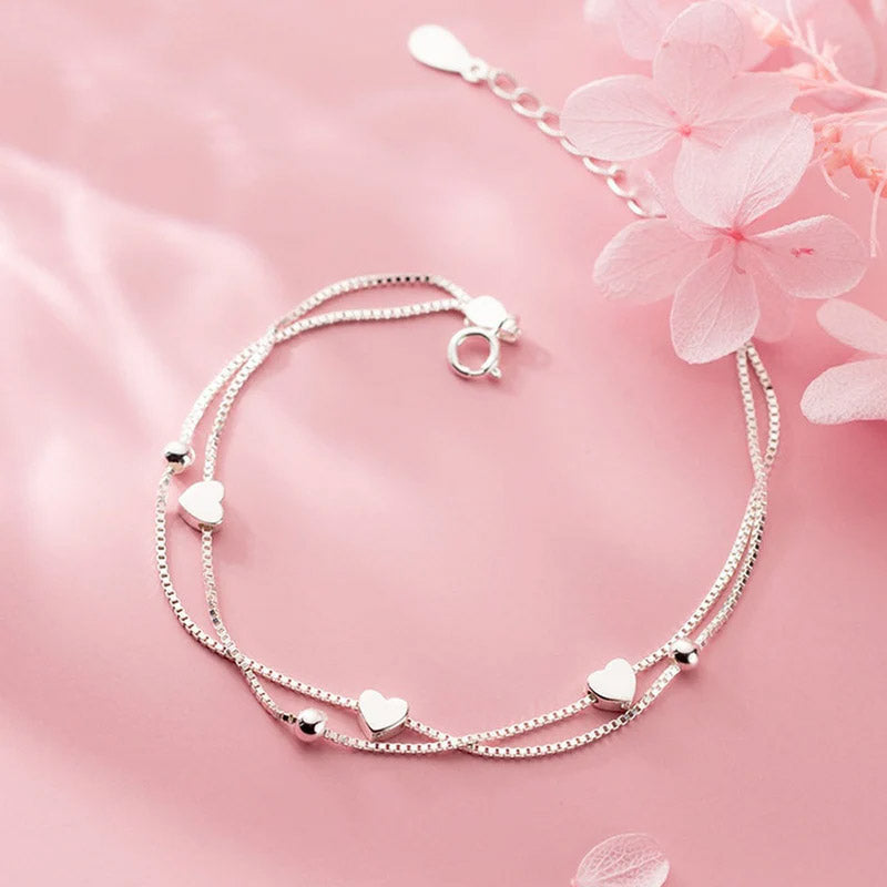 Evelyn - Armband med dubbla kedjor och små hjärtan