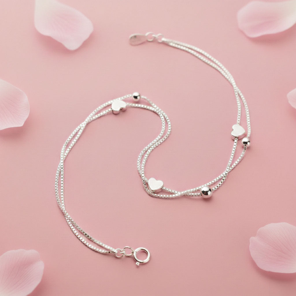 Evelyn - Armband med dubbla kedjor och små hjärtan