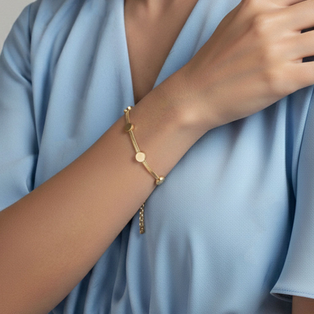 Inca - Armband i ormbenskedja med dekorativa plattor