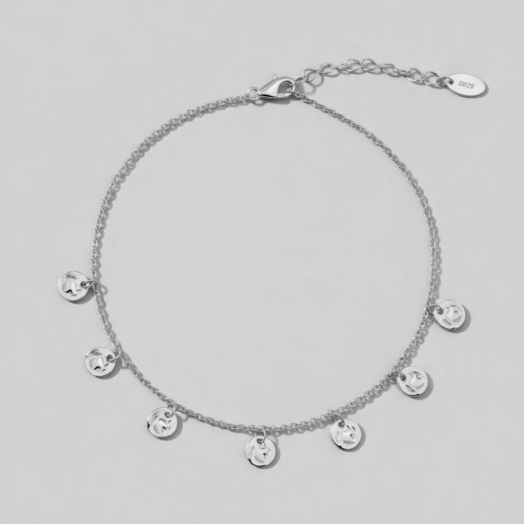 Marbella – Fotlänk med hamrade hängen