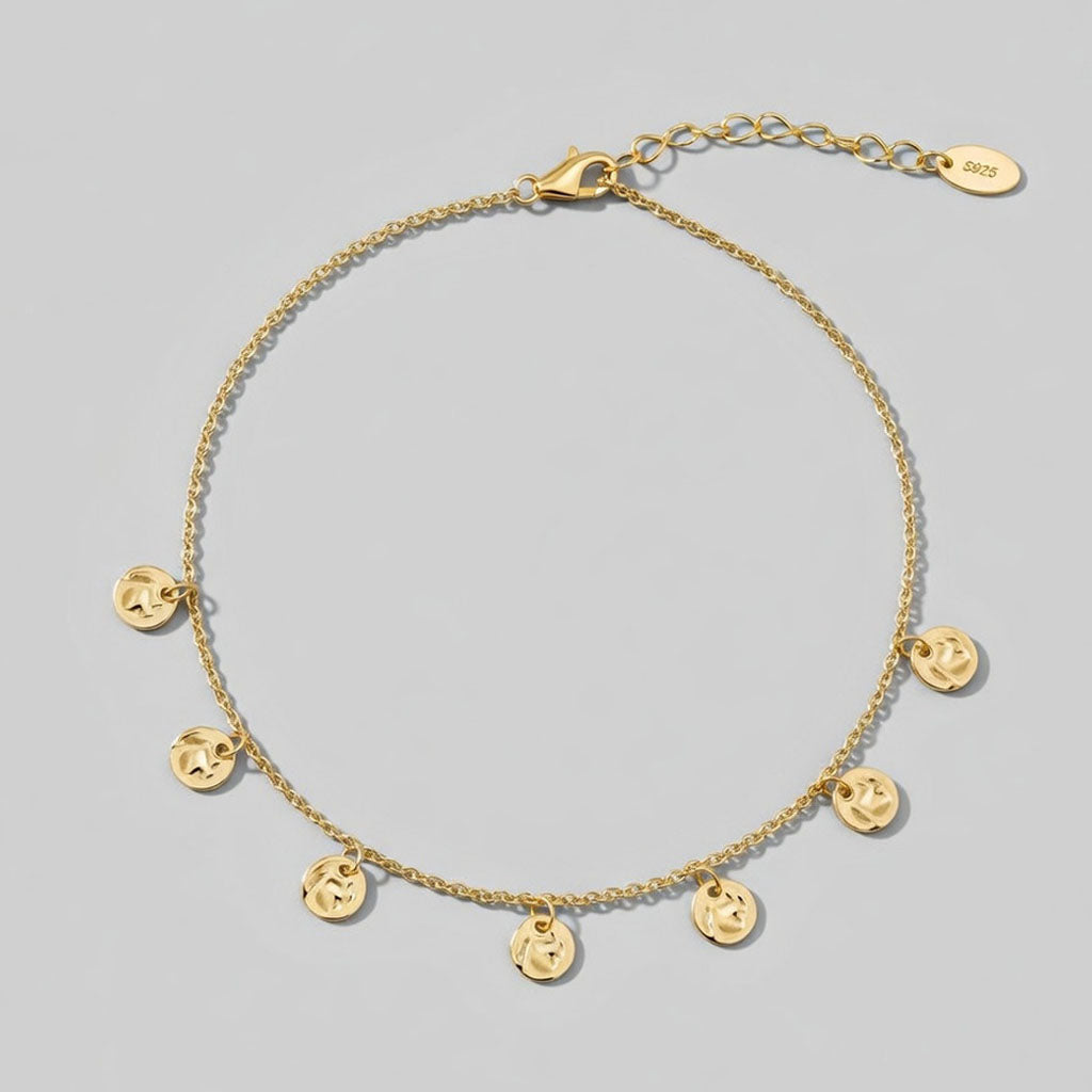 Marbella – Fotlänk med hamrade hängen