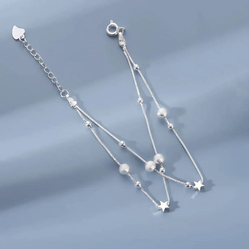 Nova - Armband med dubbla kedjor och kosmiskt motiv