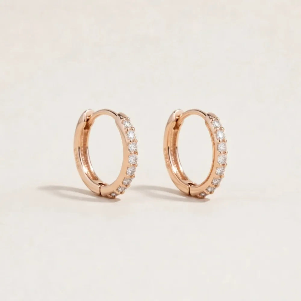 Rose gold huggie hoop earrings adorned with clear stones for helix piercing called sophie små huggies