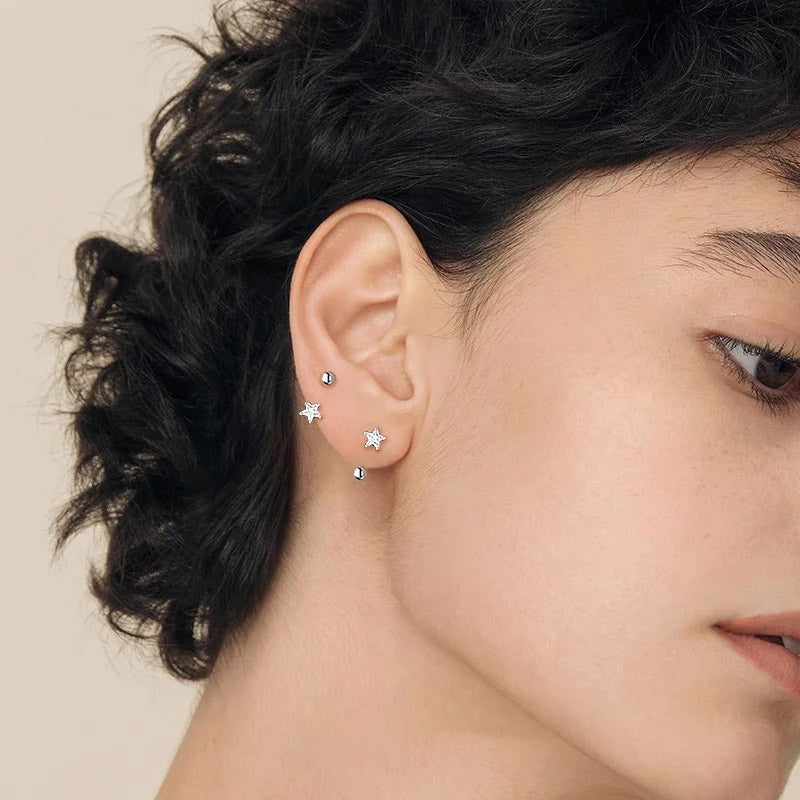 Stardust - Örhängen med krokdesign och skruvplopp