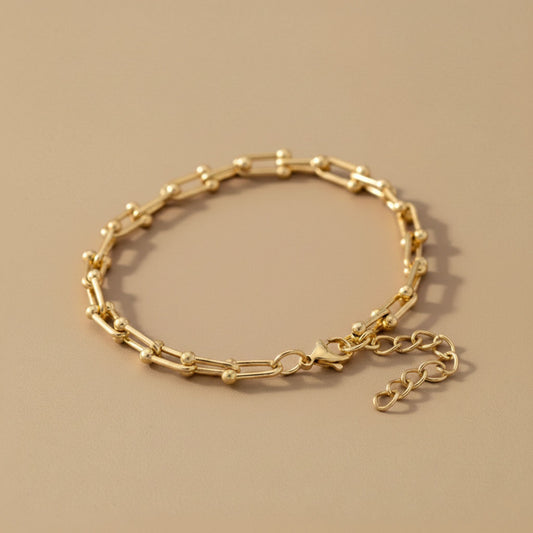 U-Turn - Armband med kedja av sammanlänkade hästskor