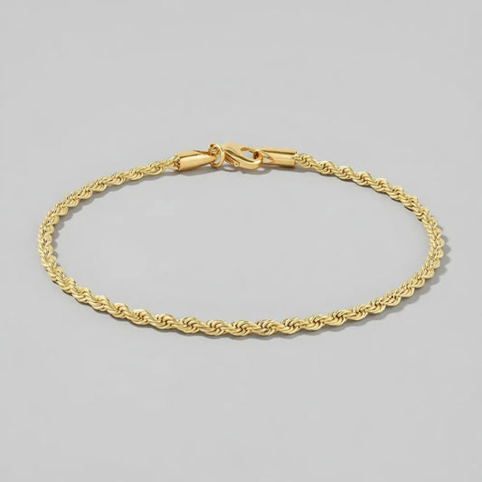 Vigdis fotlänk med tvinnad guldfärgad kedja och säker låsning för bekväm användning